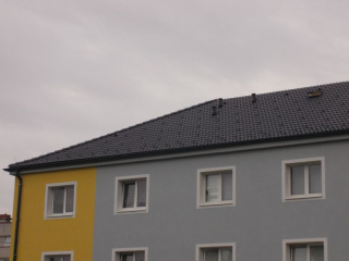 Rekonstrukce střechy na bytovém domě - tesařské, p