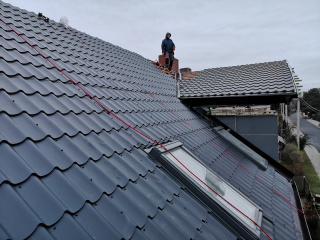 Pokrytí střechy hliníkovým plechem včetně zateplen